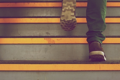 person walking on stairs